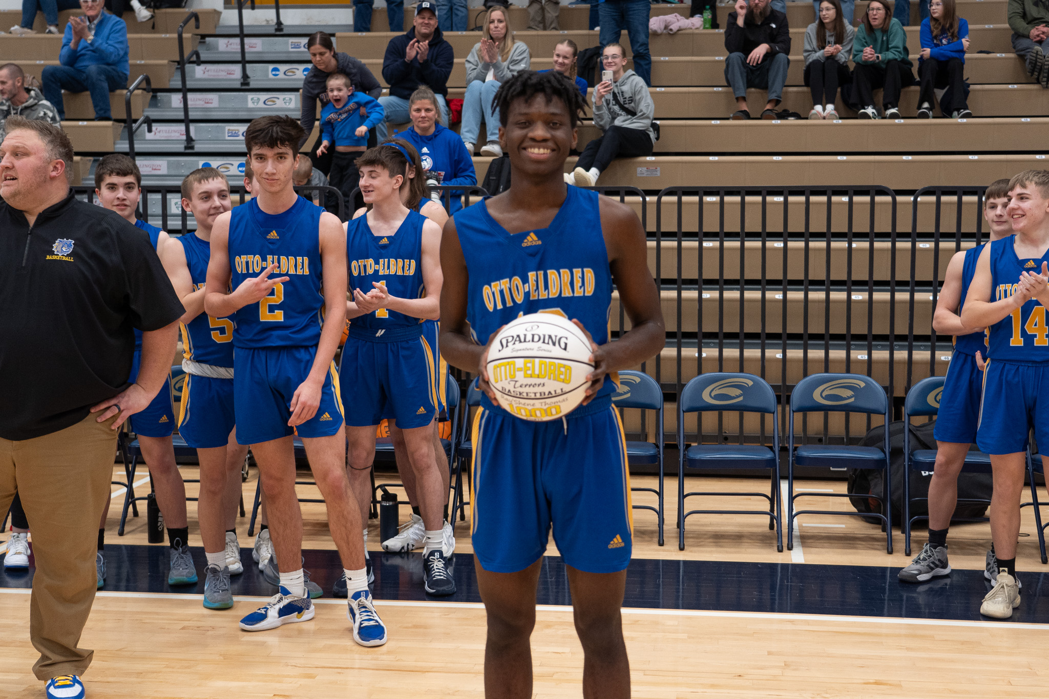 Otto-Eldred's Shene Thomas poses with his celebratory basketball after scoring his 1,000th point on Saturday. Thomas ended with 21 points in the Terrors' 73-26 win over Moniteau. | Photo by Hunter O. Lyle