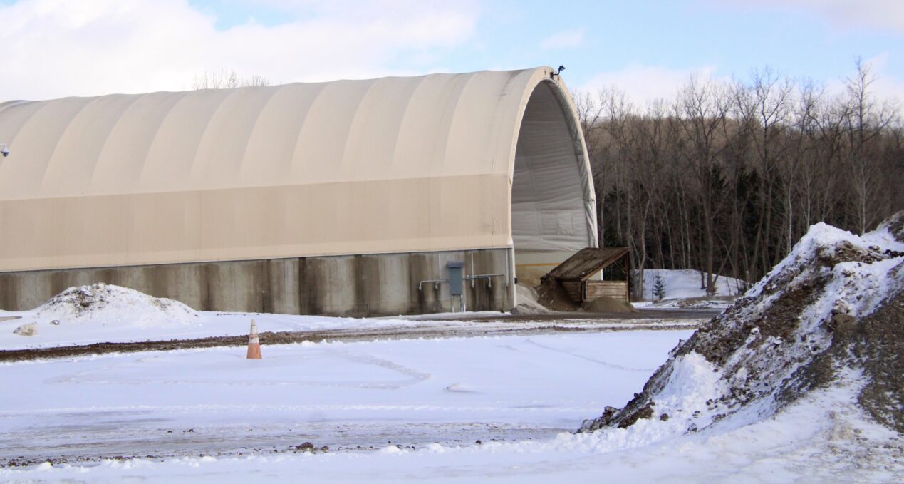 (Rick Miller/Olean Star) The salt storage facility at the Cattaraugus County Public Works Highway Barn in Franklinville, like other barns around the county, is running short of road salt.