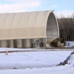 (Rick Miller/Olean Star) The salt storage facility at the Cattaraugus County Public Works Highway Barn in Franklinville, like other barns around the county, is running short of road salt.