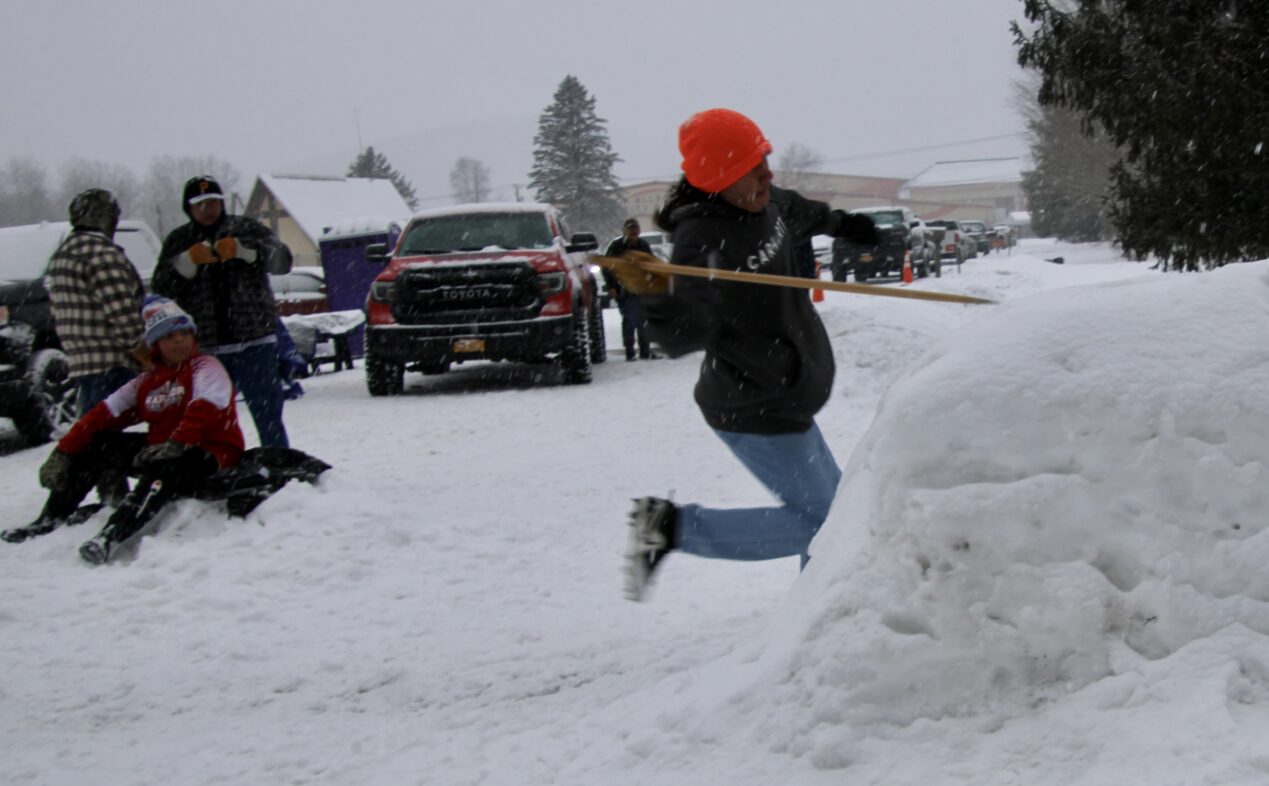 (Rick Miller/Olean Star)
Rylan Redeye, a member of the Oneida Nation living on Onondaga Territory in Central New York, participates in Saturday's mudcat competition in Jimersontown on the Allegany Territory. Snowsnake competition continues Sunday at 11 a.m.