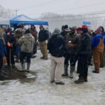 (Rick Miller/Olean Star) Striking corrections officers at their strike headquarter across Route 62 from the Collins Correctional Facility north of Gowanda on Thursday. The community has been supporting the strikers with food, shelter and wood to help keep warm on the picket line.