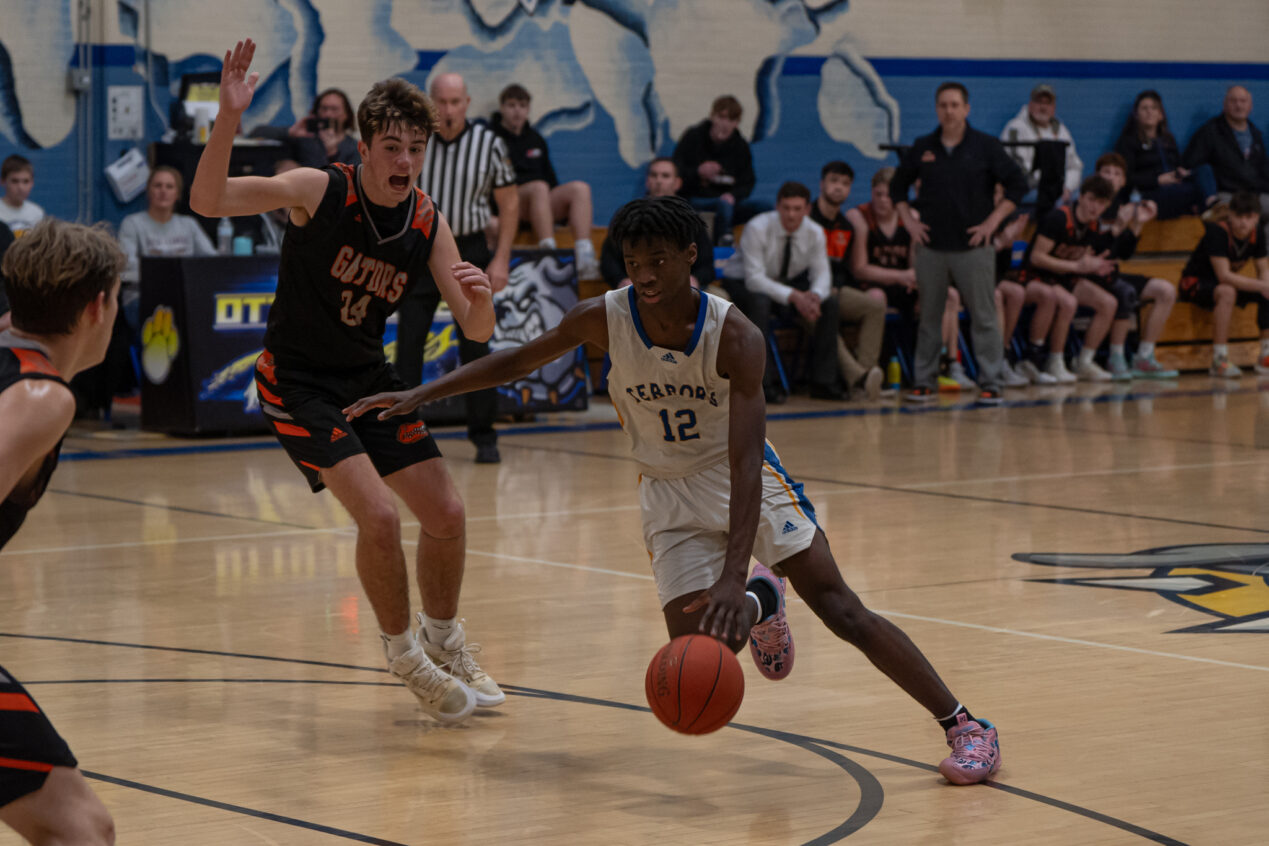 Shene Thomas fights his way to the rim during the Terrors' win over Port Allegany. Thomas ended with 15 points in the win. | Photo by Hunter O. Lyle