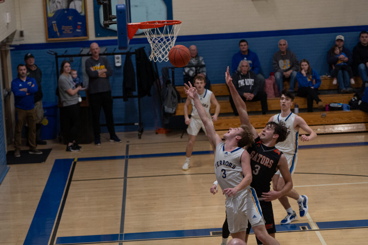 Otto-Eldred's Landon Francis stretches out for a contested layup during the Terrors' 45-40 overtime win against Port Allegany. In a night where O-E's offense ran cold, Francis scored a game-high 22 points. | Photo by Hunter O. Lyle