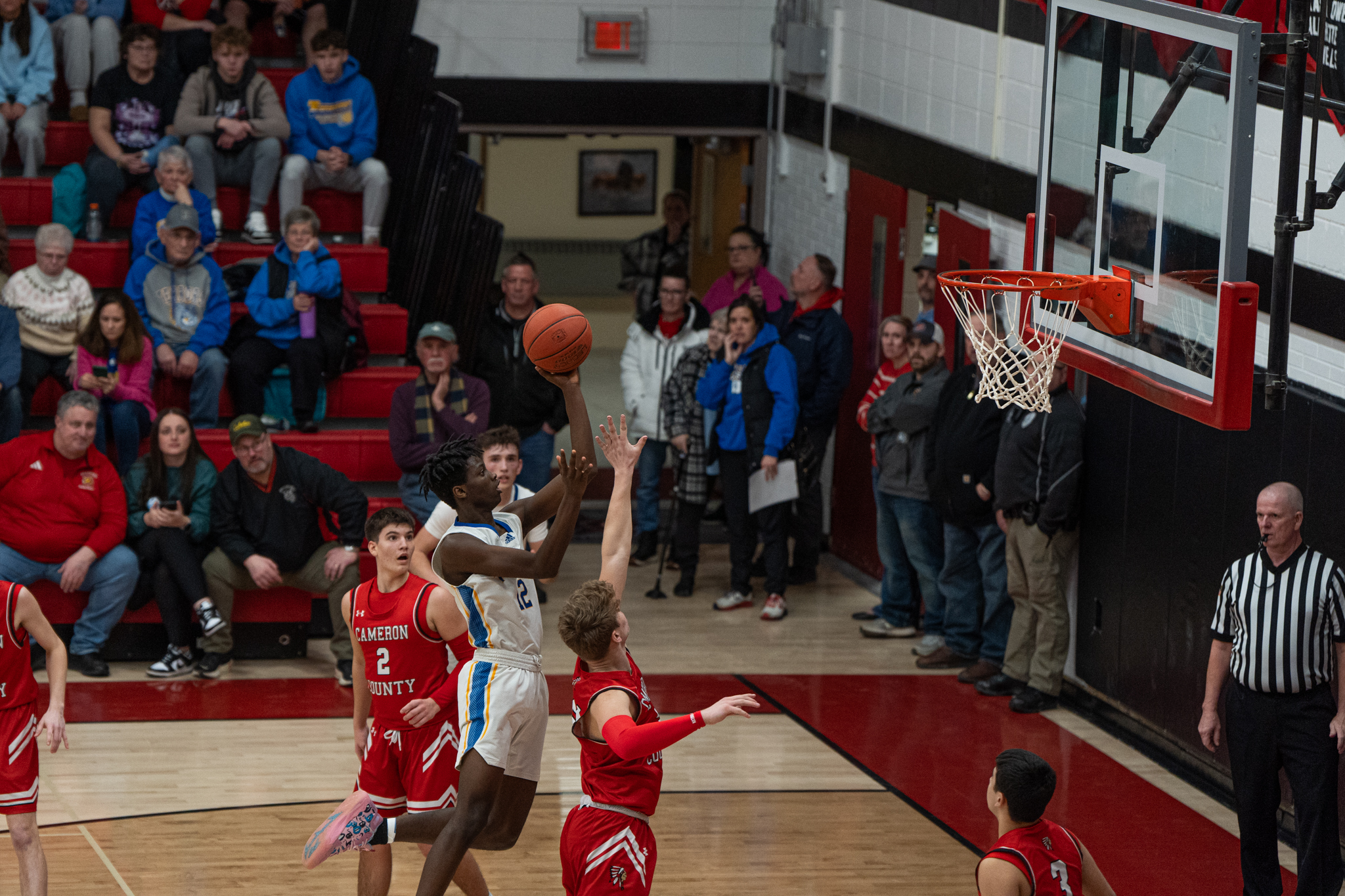 Otto-Eldred's Shene Thoams floats towards the rim during the Terrors' loss to Cameron County in the North Tier League championship. Thomas would end with 13-points in O-E's first league loss in four years. | Photo by Hunter O. Lyle