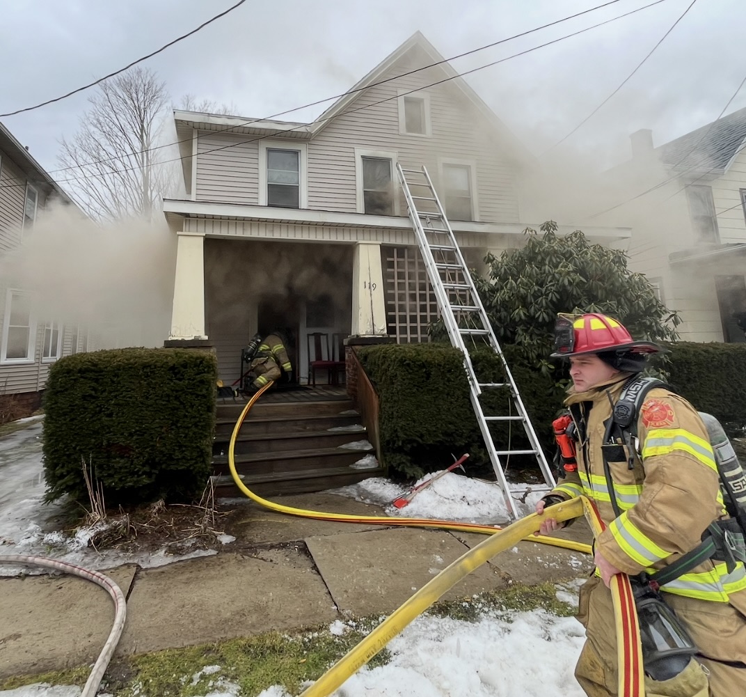 Olean firefighters battle a blaze Thursday morning at 119 N. Sixth St. Two firemen suffered minor injuries. The cause of the fire is under investigation. (Olean Fire Department Photo)