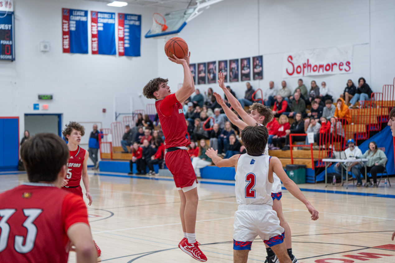 Bradford's Tarren Reese stops and pops to shoot over two Dutchmen defenders during the Owls' loss to St. Marys in the D9 Class 4A semifinals. | Photo by Hunter O. Lyle