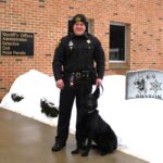 (Cattaraugus County Sheriff's Office photo) Cattaraugus County Sheriff's Deputy Justin Grimm stands with his K-9 partner Lex, a specially trained German shepherd, outside the Sheriff's Office in Little Valley. The Seneca Nation donated funding for the department's latest K-9.