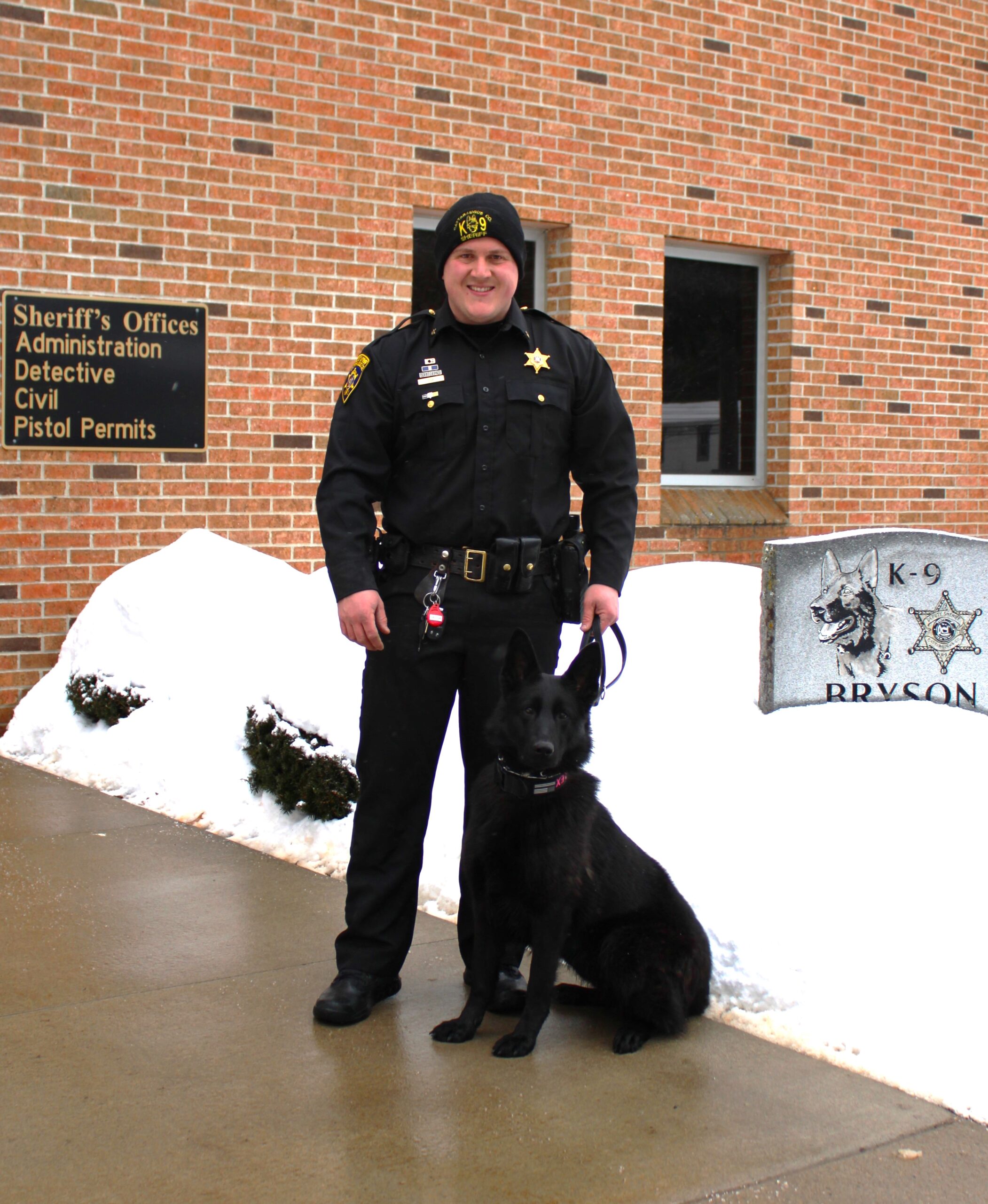 (Cattaraugus County Sheriff's Office photo) Cattaraugus County Sheriff's Deputy Justin Grimm stands with his K-9 partner Lex, a specially trained German shepherd, outside the Sheriff's Office in Little Valley. The Seneca Nation donated funding for the department's latest K-9.