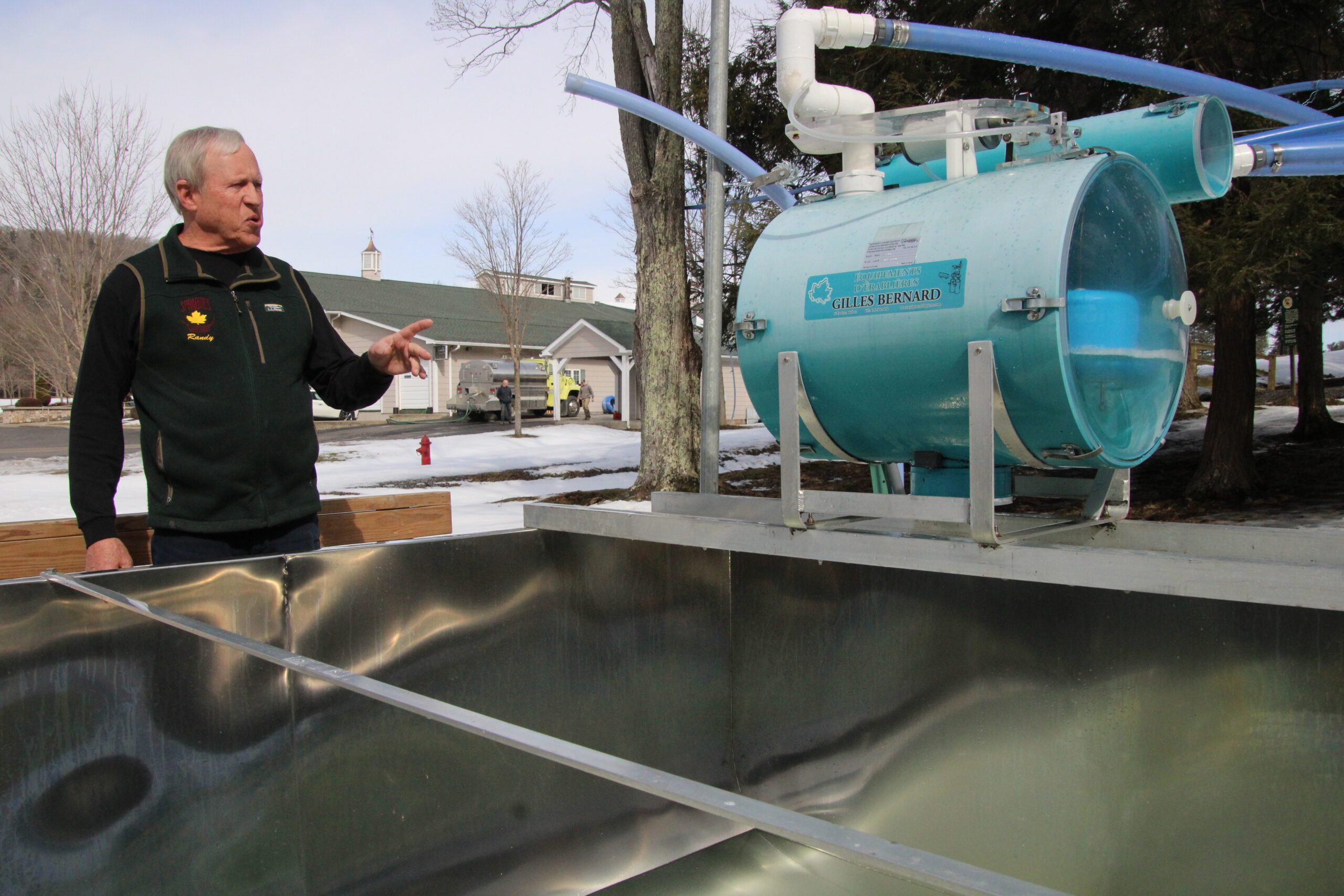 (Rick Miller/Olean Star) Randy Sprague, owner of Sprague Maple Farms watches over a valve that releases sap from the plastic tubing into a tank behind Sprague’s Restaurant.