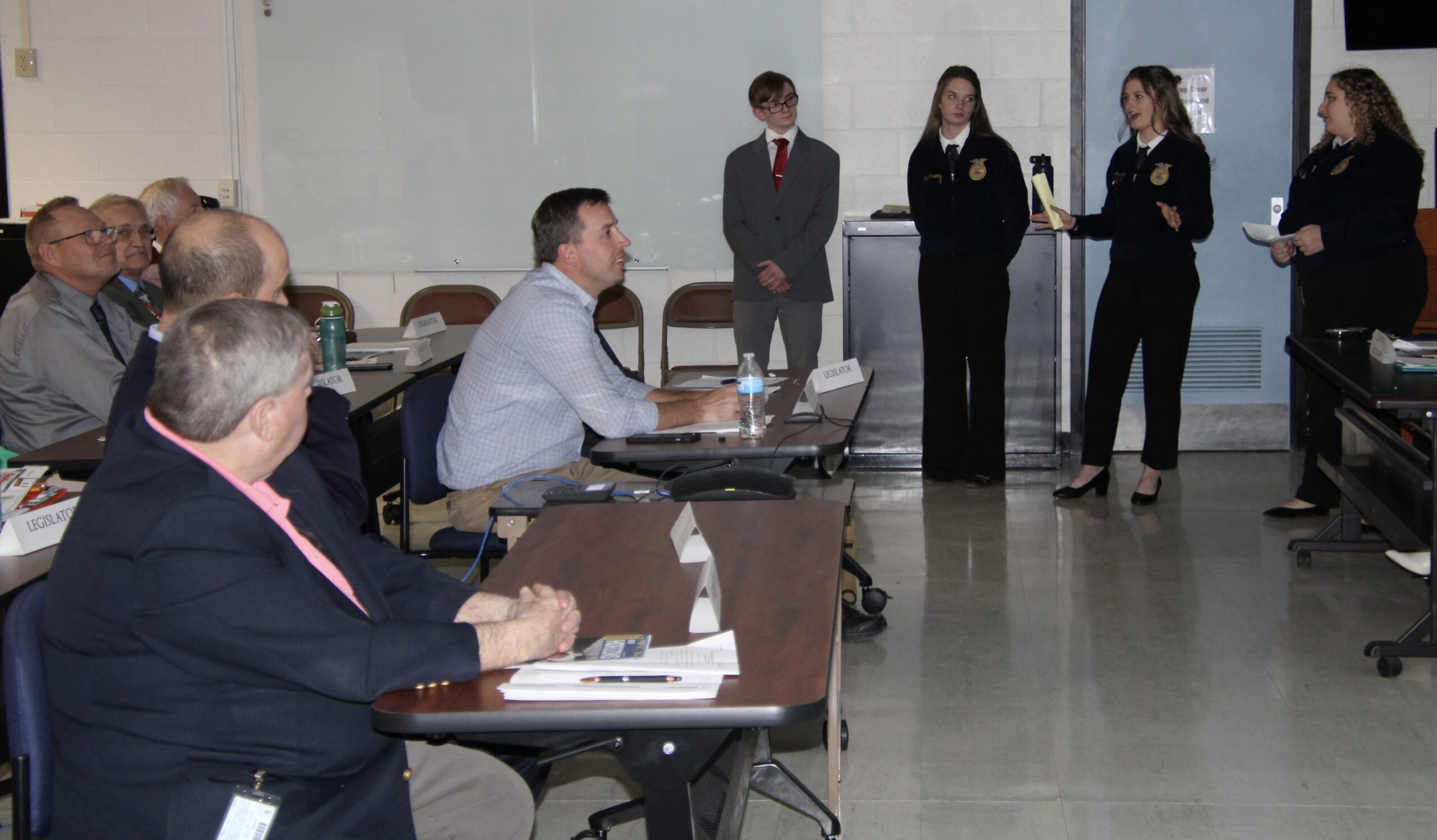 (Rick Miller/Olean Star) Members of the Randolph Future Farmers of America describe their efforts at rebranding local agriculture to members of the Cattaraugus County legislature on Wednesday, Farm Bureau Day.