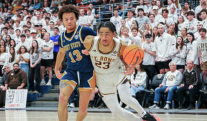 Noah Bolanga, a freshman guard from France, drives to the basket against Kent State Tuesday night. St. Bonaventure photo)