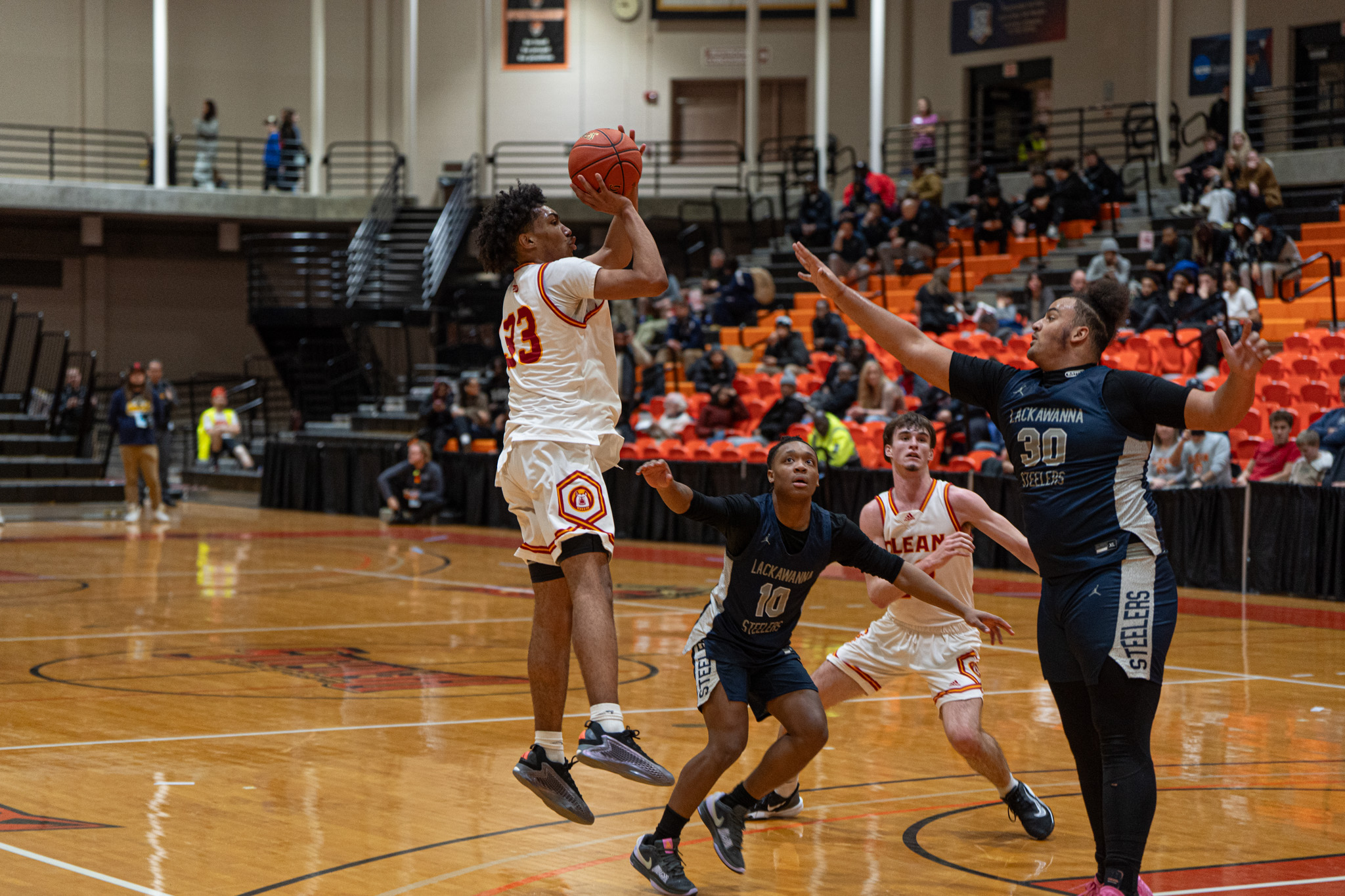 Olean's Mykel Rivera takes a contested jumper during the Huskies' loss to Lackawanna in the Section VI Class A2 semifinals. Rivera would end with a team-high 17 points. | Photo by Hunter O. Lyle