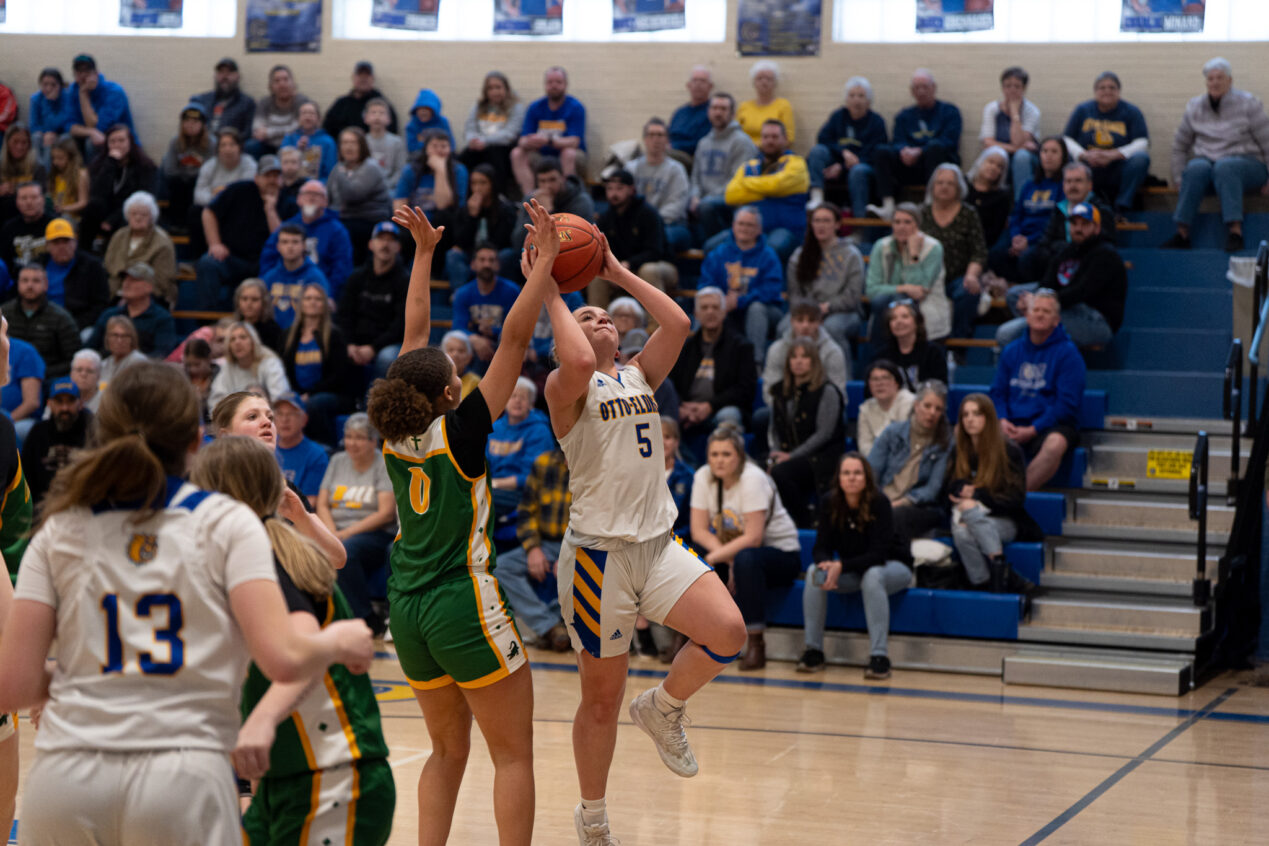 Carrie Drummond fights through traffic on her way to the rim during the Lady Terrors' win over Geibel Catholic on Saturday. Drummond would end with 17 points. | Photo by Hunter O. Lyle