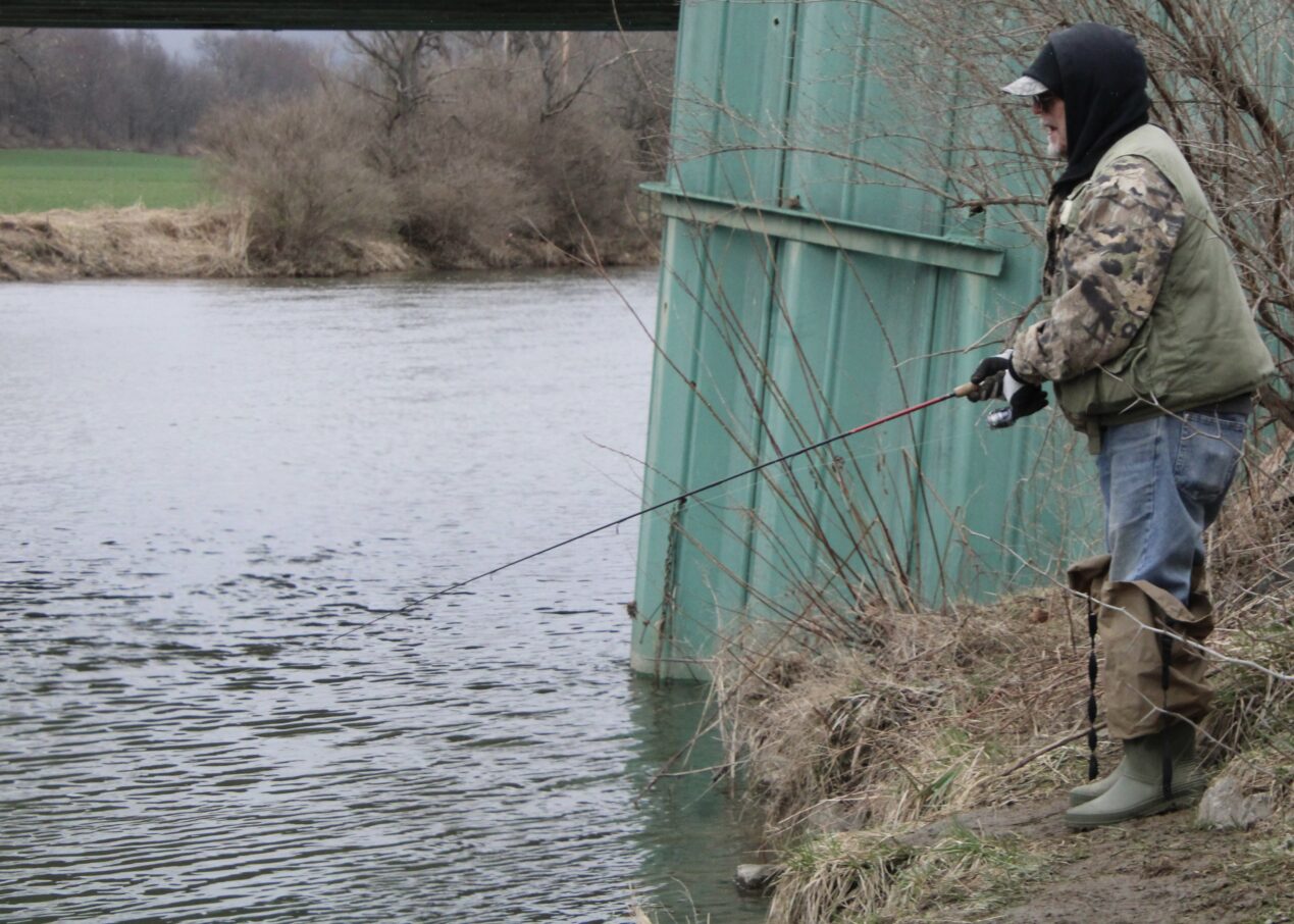 (Rick Miller/Olean Star) Joe Augustyn of Olean spent the first day of trout fishing on the bank of Ischua Creek in Hinsdale.