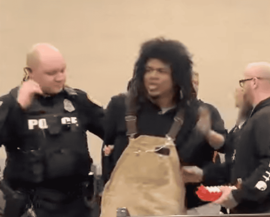 (Olean YouTube Channel) Carlos Andres, 43, of Salamanca, is led from the March 25 Olean Common Council meeting where he was charged with disorderly conduct. He was to appear in Olean City Court Thursday, but was arrested by Immigration and Customs Enforcement Wednesday.